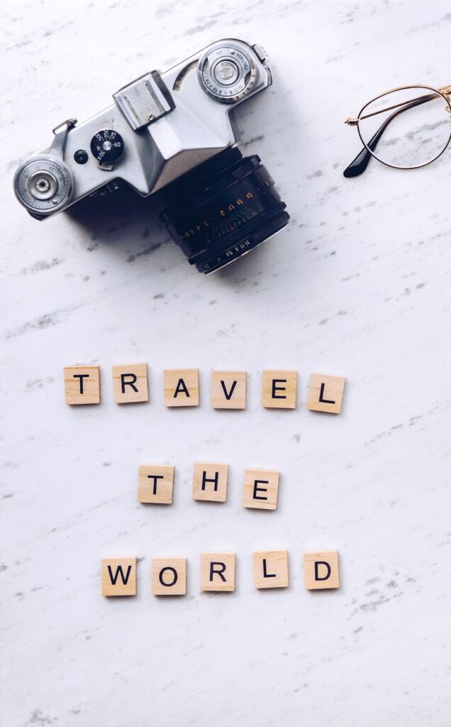 Travel the world words made from wooden letters. Travel concept
